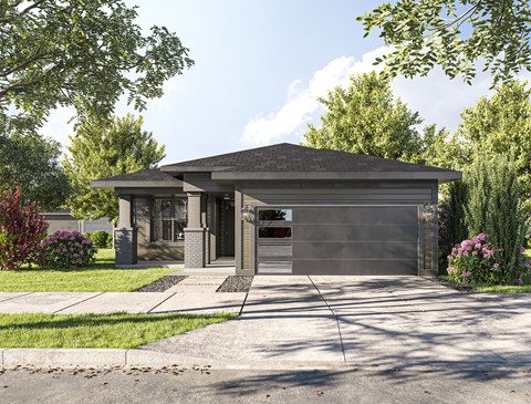 a house with a gray roof and gray garage doors